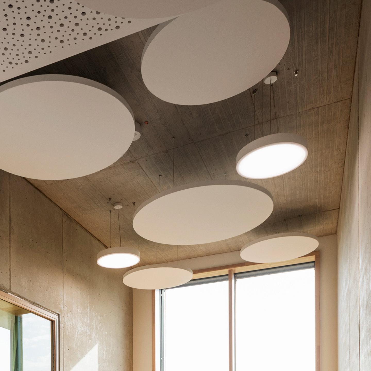 Bring character to your modern office design with Rockfon Eclipse Customised acoustic islands